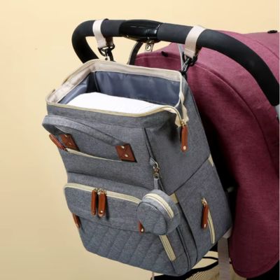 sac-a-dos-a-langer-bebe-design-attache-pousette