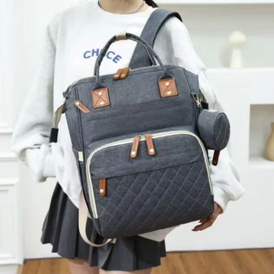 sac-a-dos-a-langer-bebe-gris-design