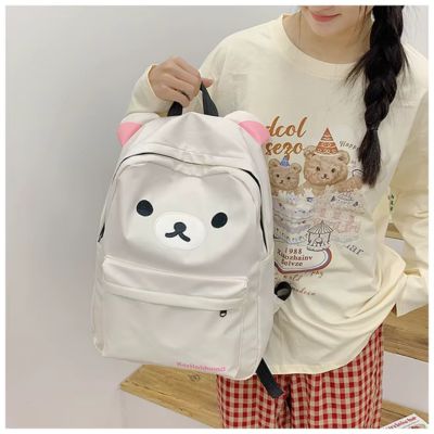 sac-a-dos-enfant-ourson-blanc-poigner